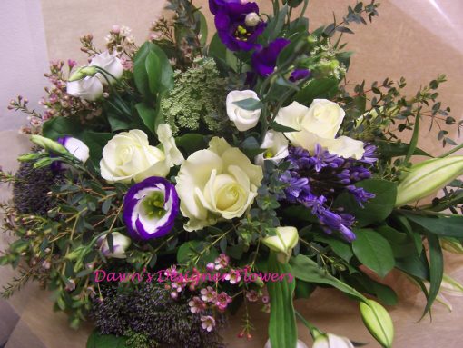 Just Smile hand tied blue, purple and white bouquet