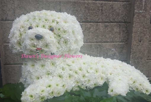 white dog from flowers