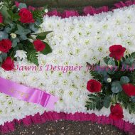 white chrysanthemums,pillow from flowers,red rose corsage